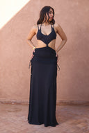 a woman in a black dress