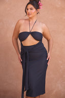 a woman in a black dress