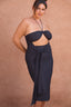 a woman in a black dress