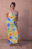 a woman in a floral dress