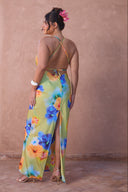 a woman in a floral dress