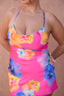 a woman wearing a colorful dress