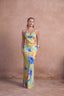 a woman in a floral dress
