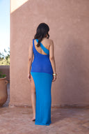 a woman in a blue dress