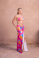 a woman in a garment and a skirt