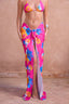 a woman wearing a colorful skirt