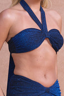 a woman wearing a blue garment