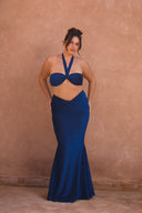a woman in a blue dress