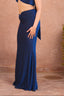 a woman in a blue dress