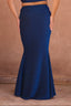 a woman wearing a blue dress